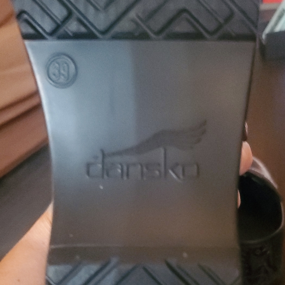 Dansko Black Embossed Leaf Pattern Clogs - image 6